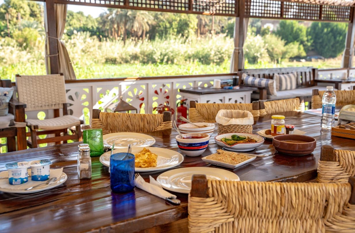 Fresh Egyptian breakfast banquet served on the open teak deck